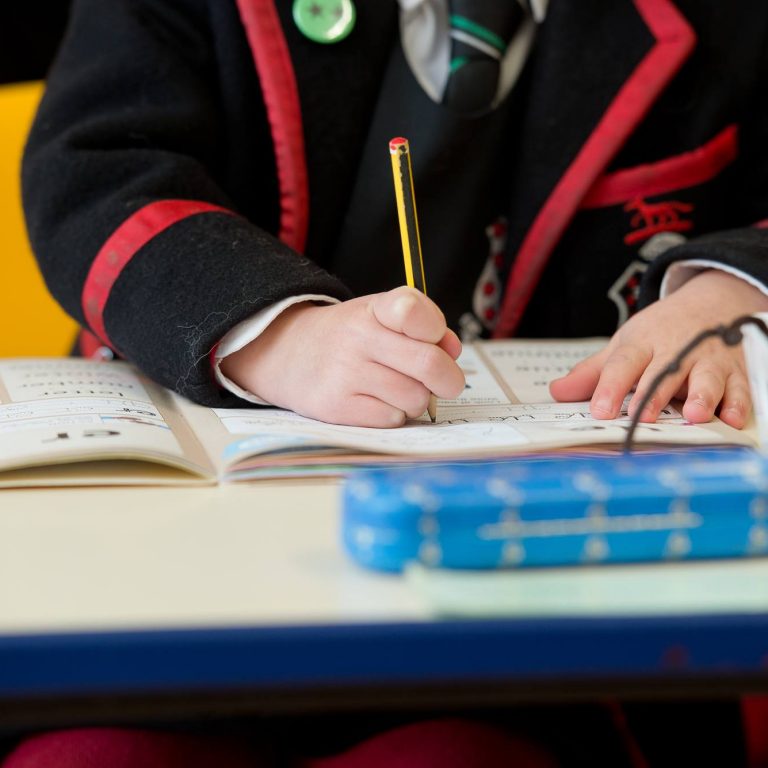 a child practising his handwriting