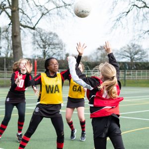 girls playing netball at a middle school in lucton