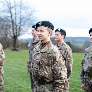 5 students in their cadet uniforms