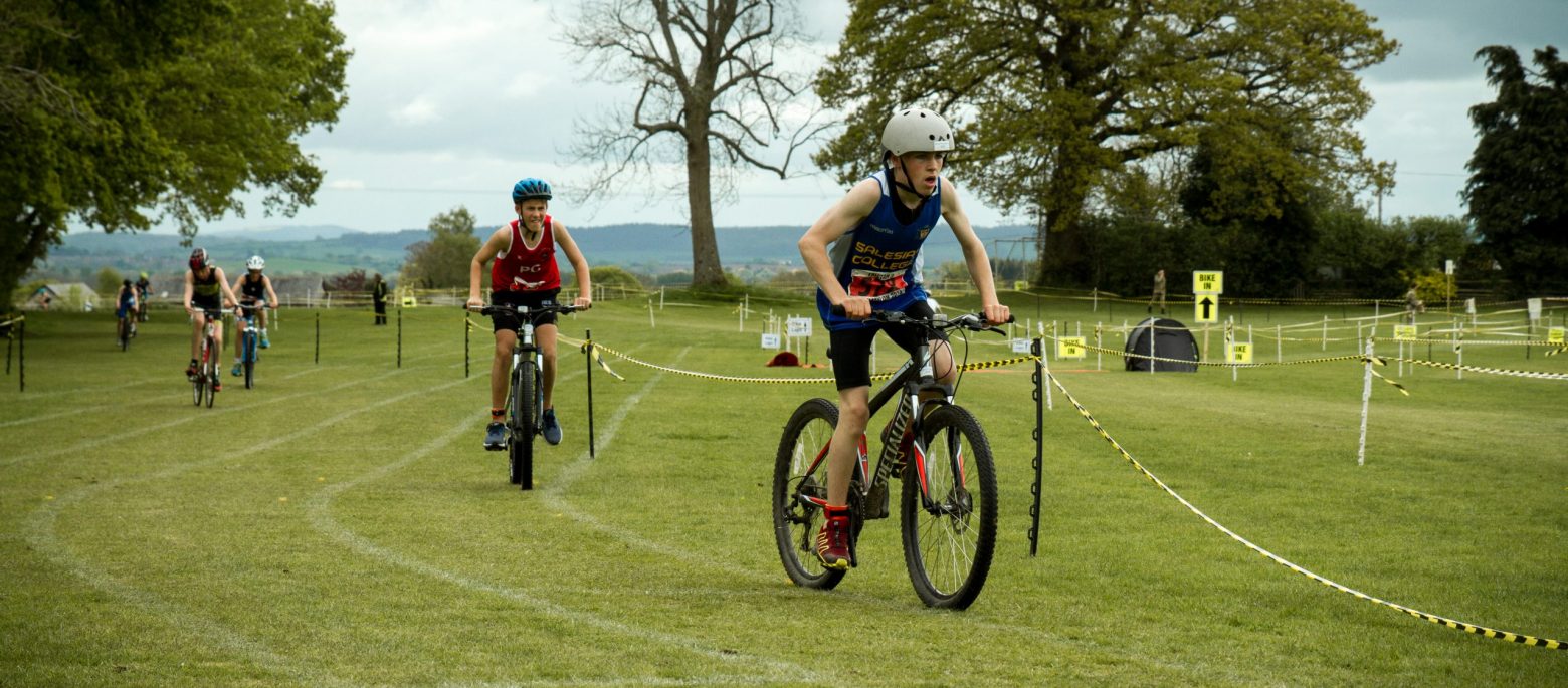 A group of boys completing the school triathlon