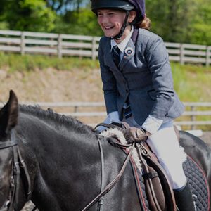 a girl horse riding