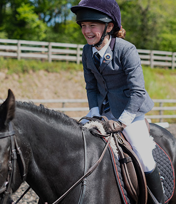 a girl horse riding