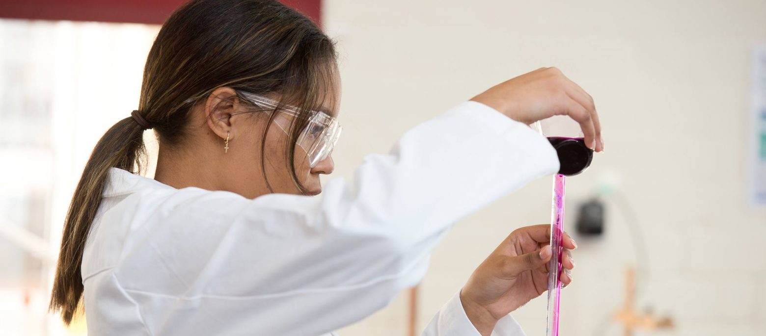 science experiment by school girl