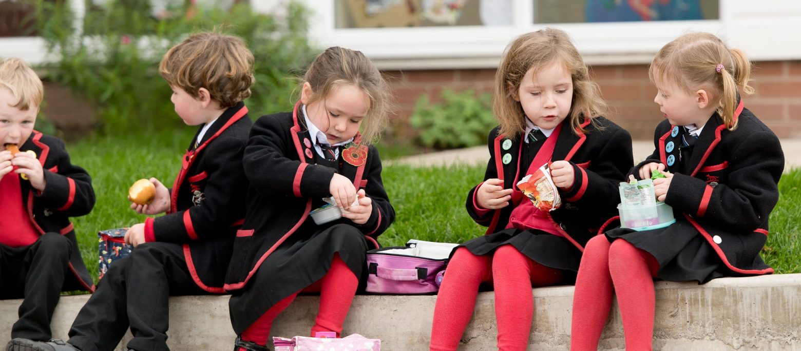 children from a boarding school in Wales having lunch