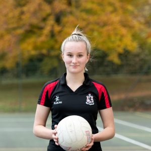 girl from a boarding school in wales holding a ball