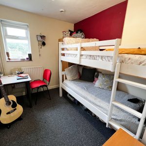 a bunk bed in the boarding facilities at the school