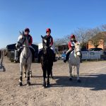 three girls on horses