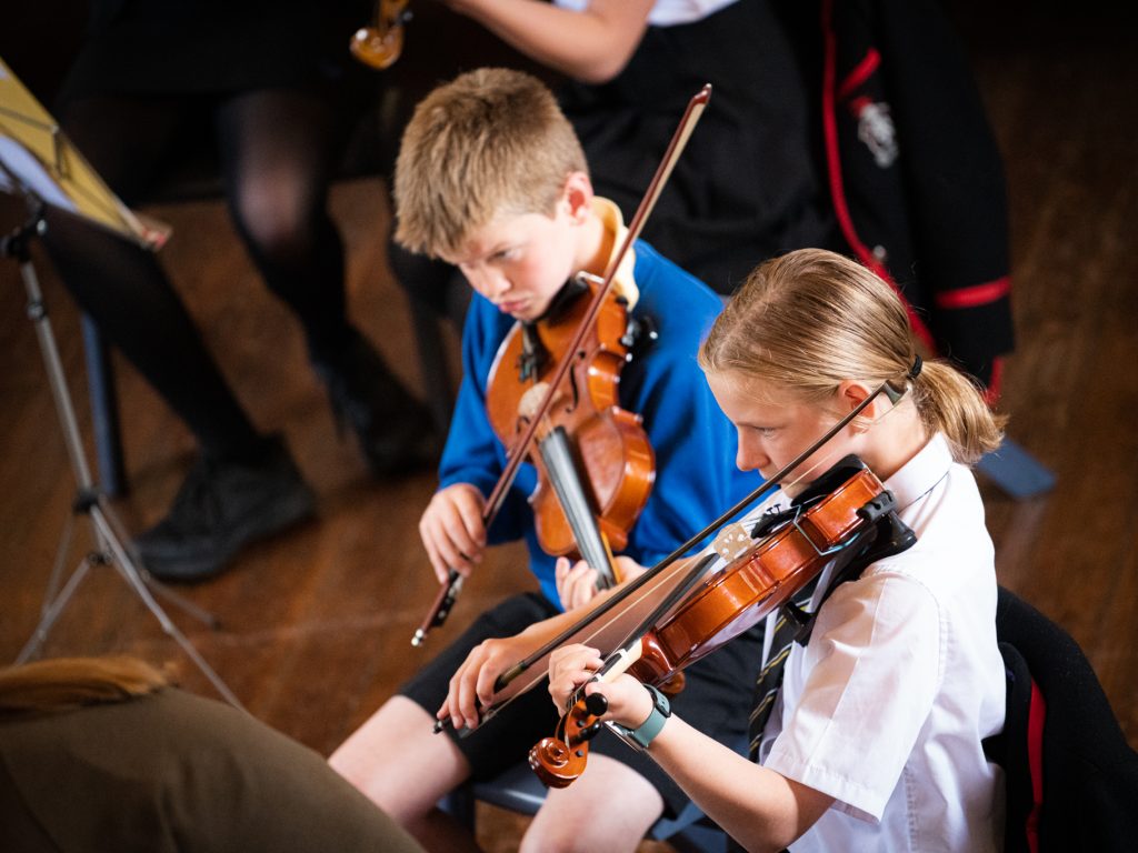 children playing the violin