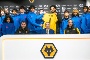 Students and coaches at Lucton International Football Academy visiting Wolverhampton Wanderers training facility