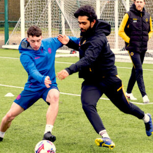 Lucton International Football Academy player training under professional coaching supervision